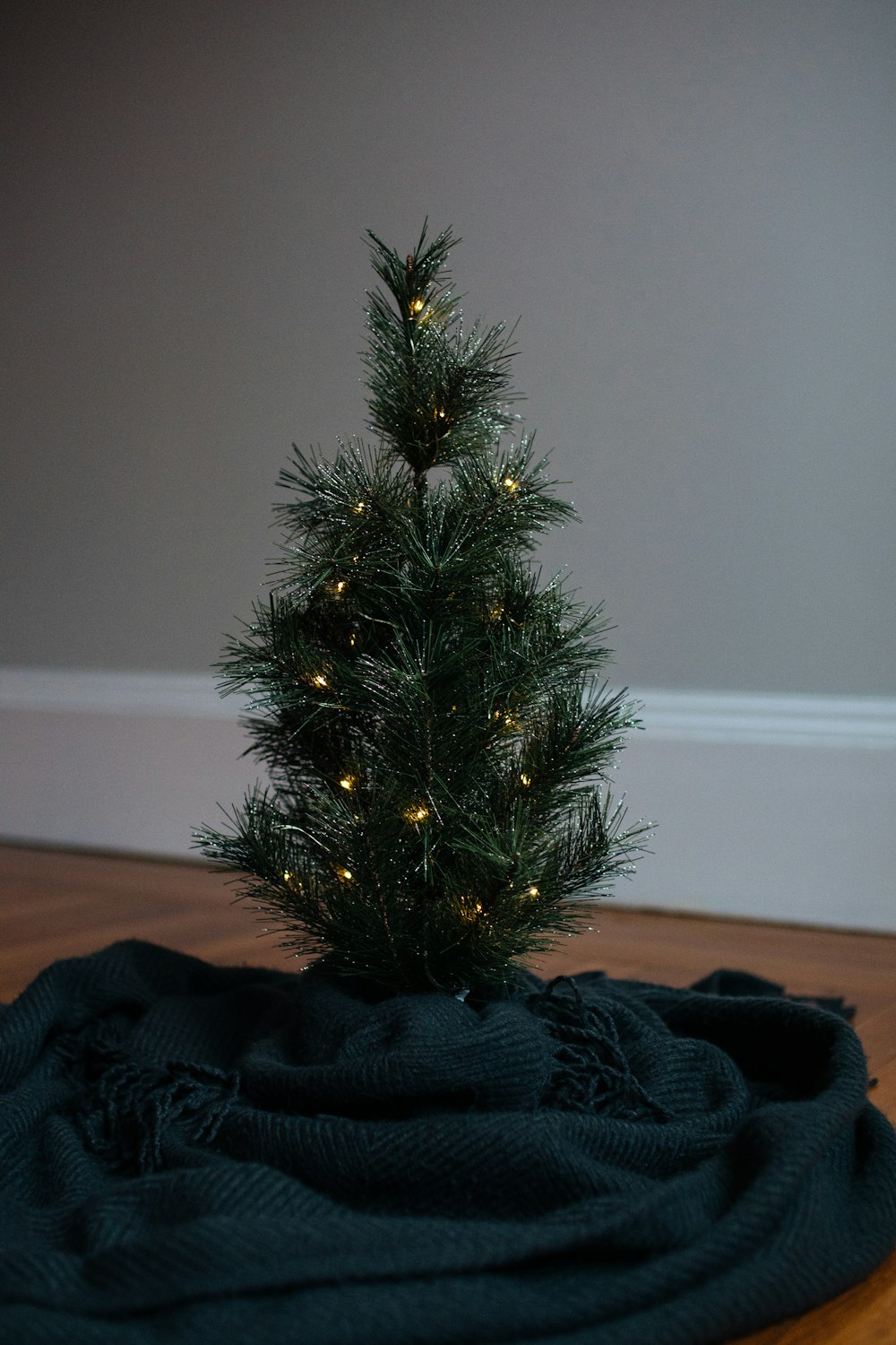 green christmas tree with string lights