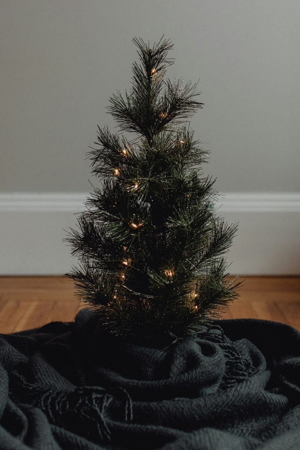 green christmas tree with string lights