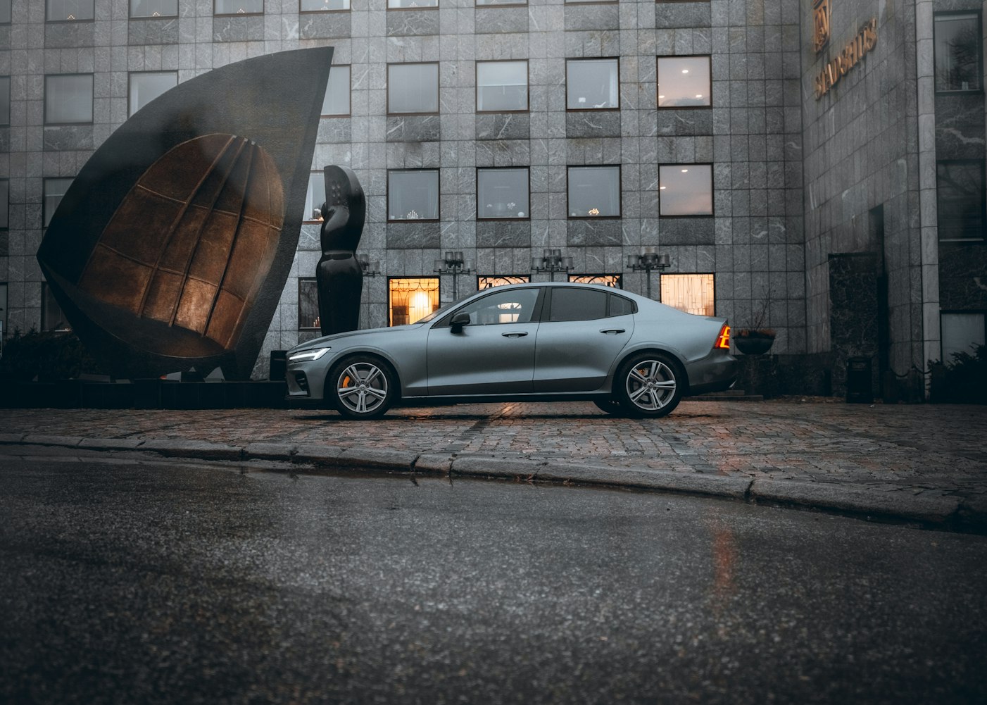 Volvo S60 parked on a city street.