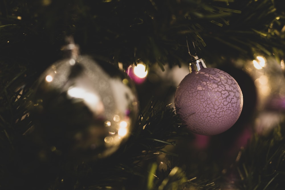 pink baubles on green christmas tree