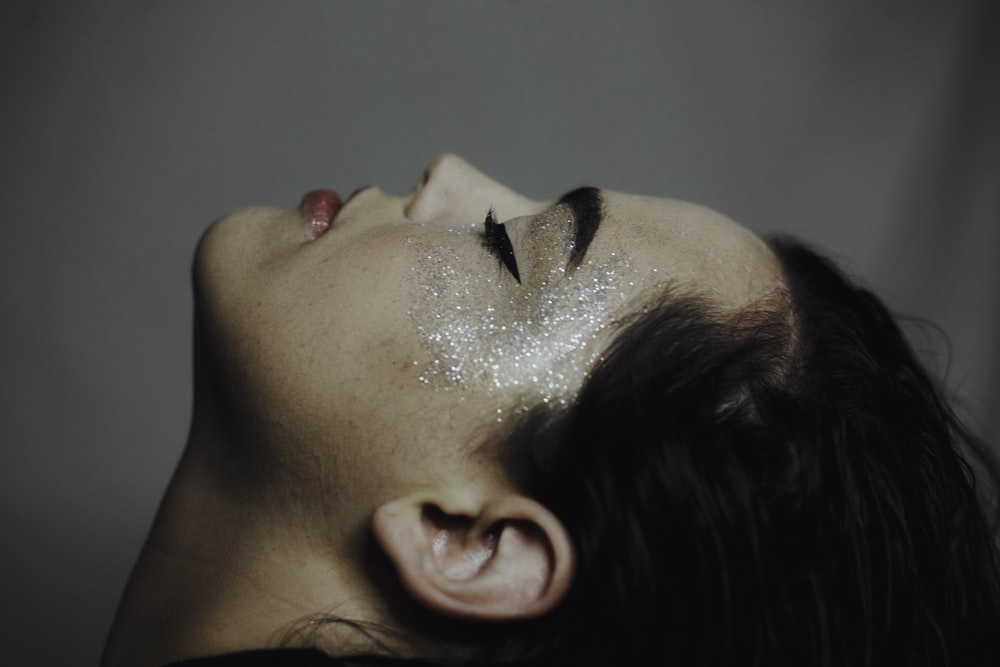 man with white powder on face