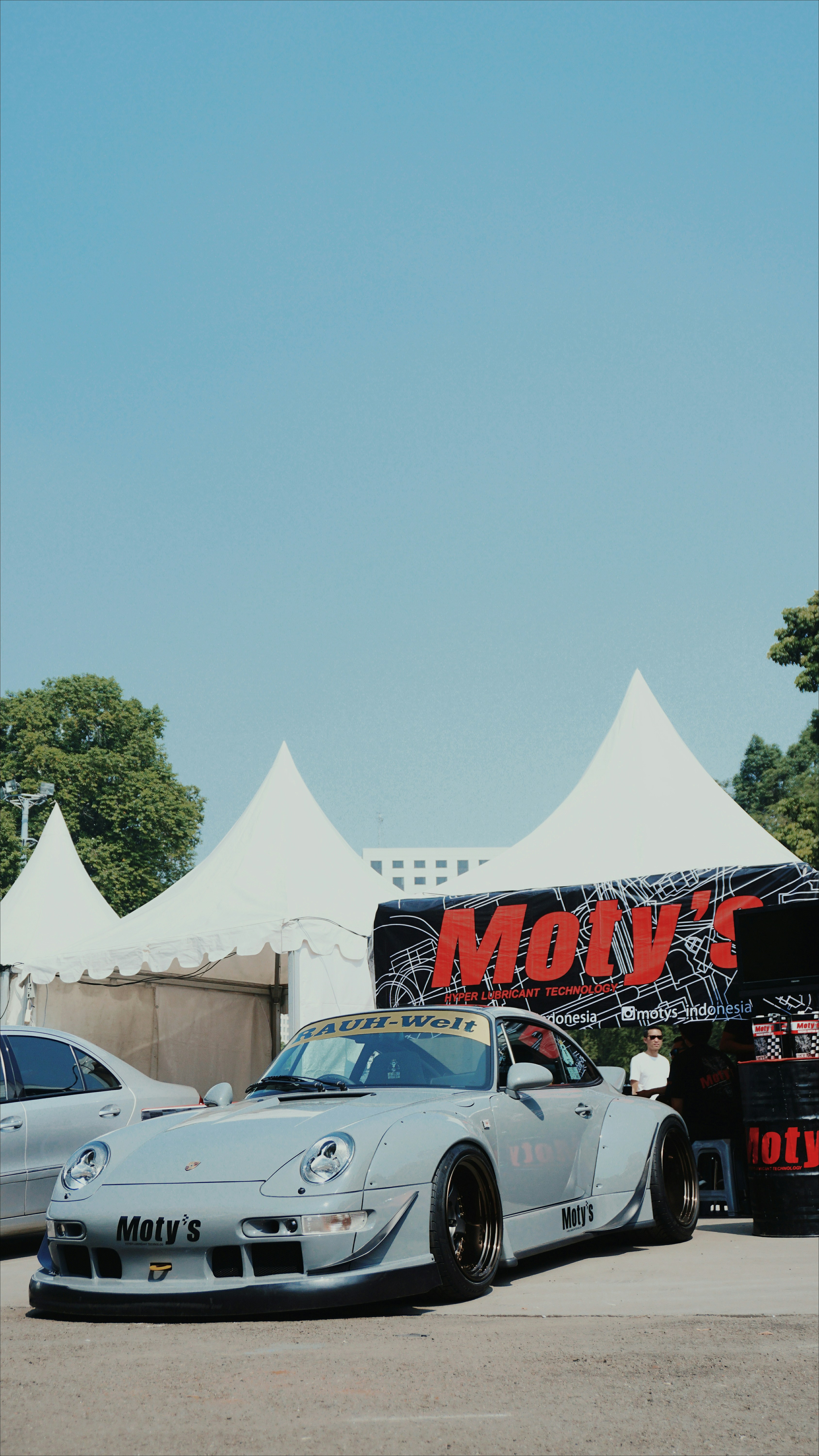 A car is a wheeled motor vehicle used for transportation. Most definitions of cars say that they run primarily on roads, seat one to eight people, have four tires, and mainly transport people rather than goods. Cars came into global use during the 20th century, and developed economies depend on them.