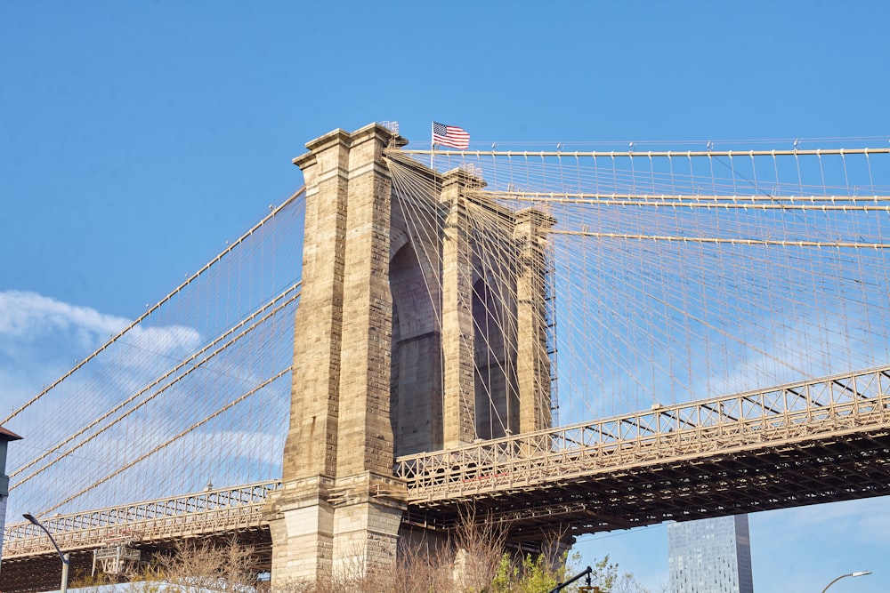 brown bridge under blue sky during daytime