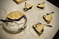 A visual breakdown of fractions using colorful pie charts and real-life items.