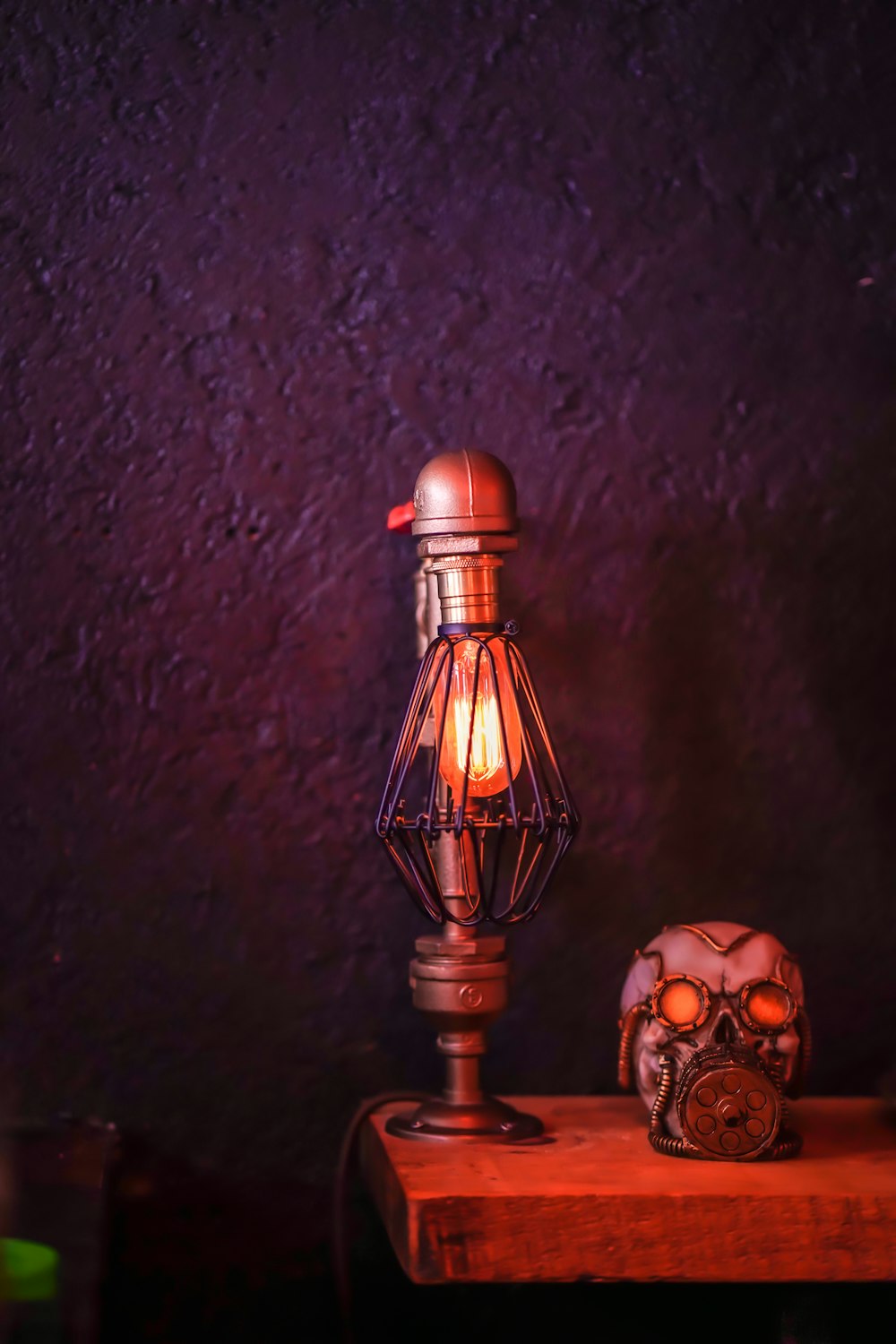 brown and black lamp on brown wooden table