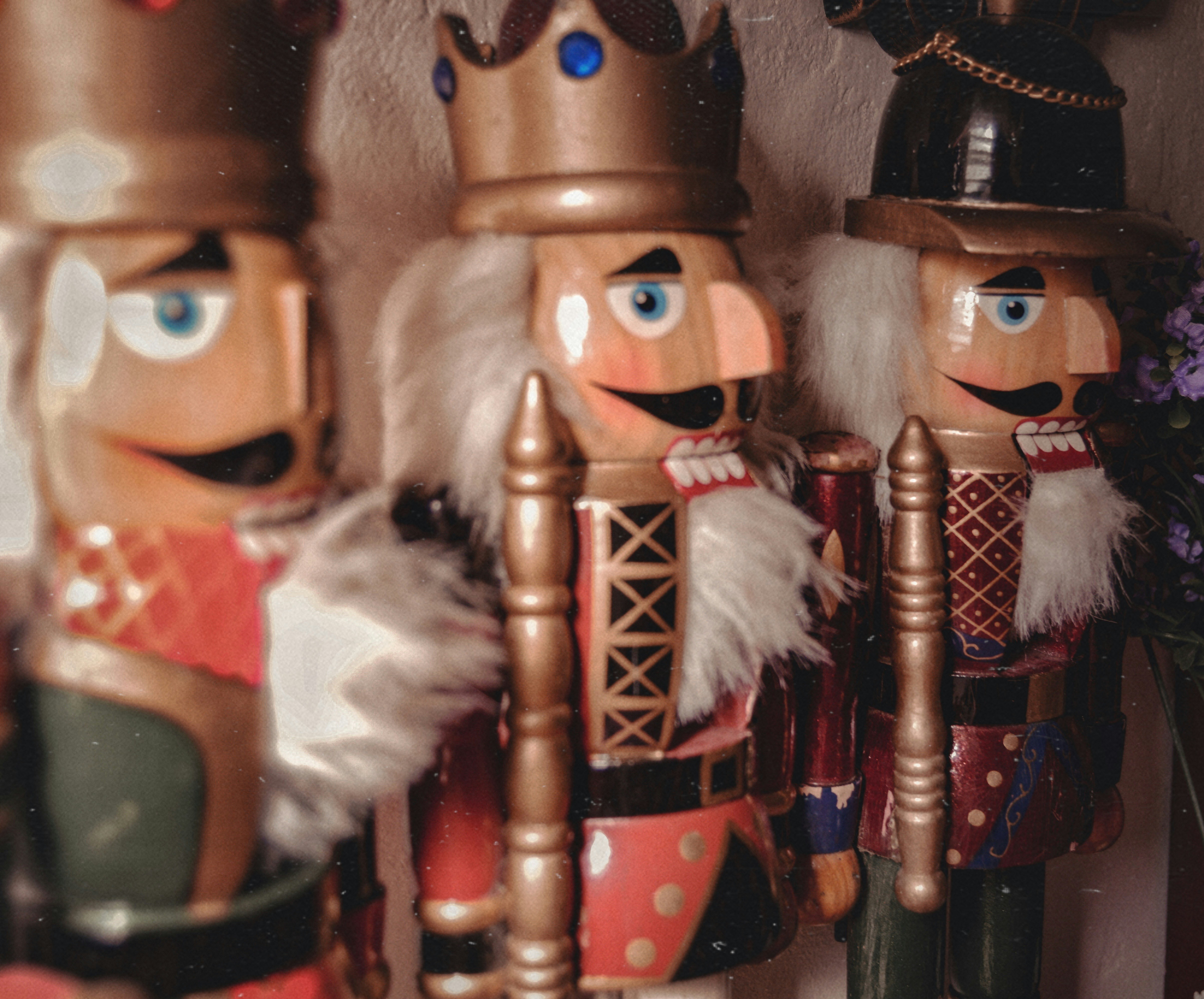 brown and white animal plush toys nutcracker teams background