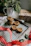 A cozy kitchen scene with freshly baked cookies on a cooling rack.