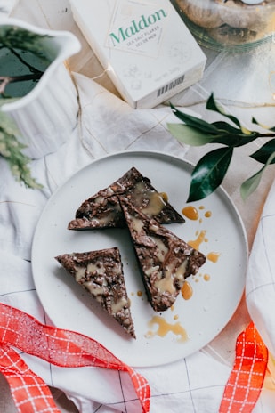 XL brownie platter with mini bites of different flavors arranged for a festive event.