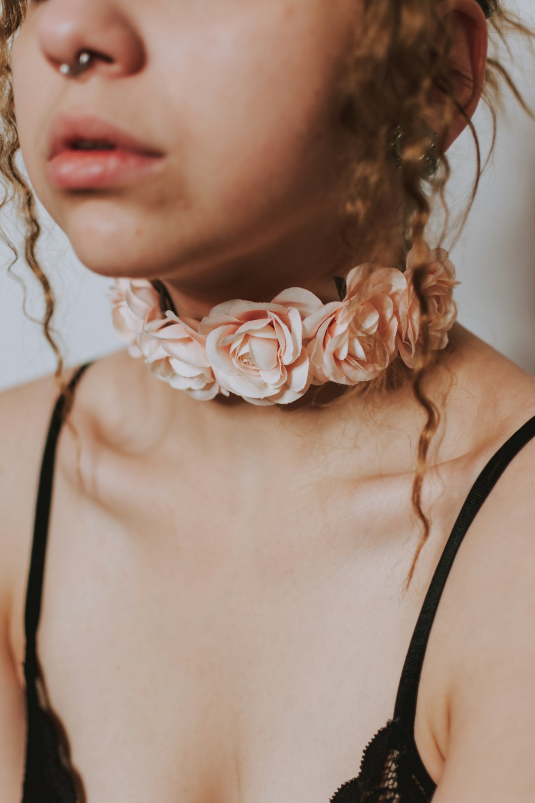 woman in white floral headband