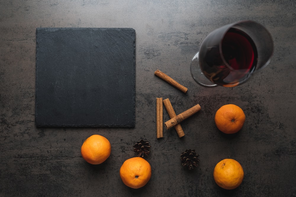 orange fruit beside black board