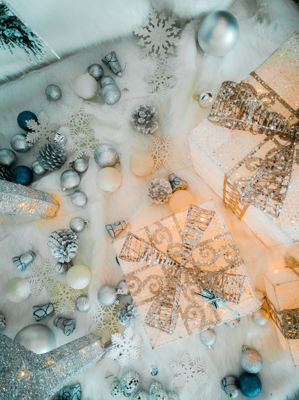 white and black stones on white textile