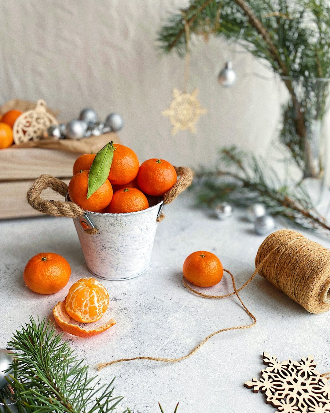 orange fruits in white ceramic bowl