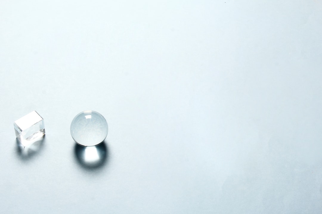 white round ornament on white surface