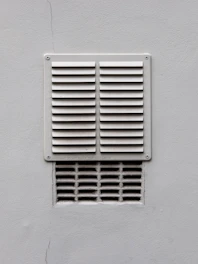 white metal window frame on white wall