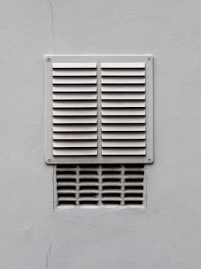 white metal window frame on white wall