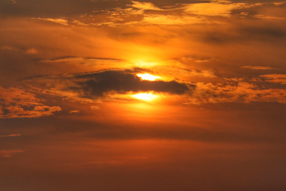 orange and grey clouds during sunset