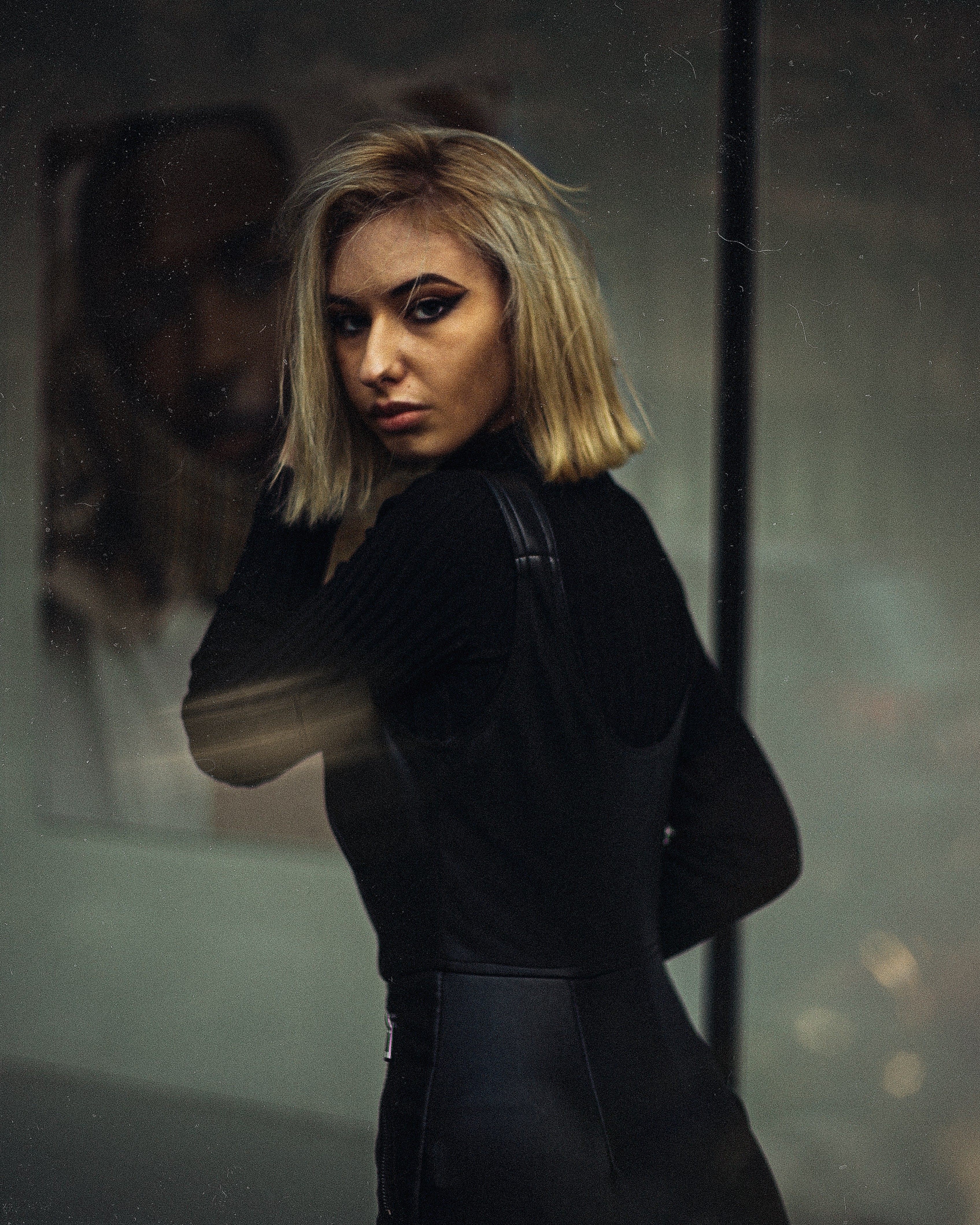 woman in black long sleeve dress