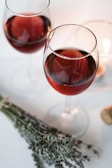 clear wine glass with red wine