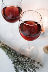 clear wine glass with red wine