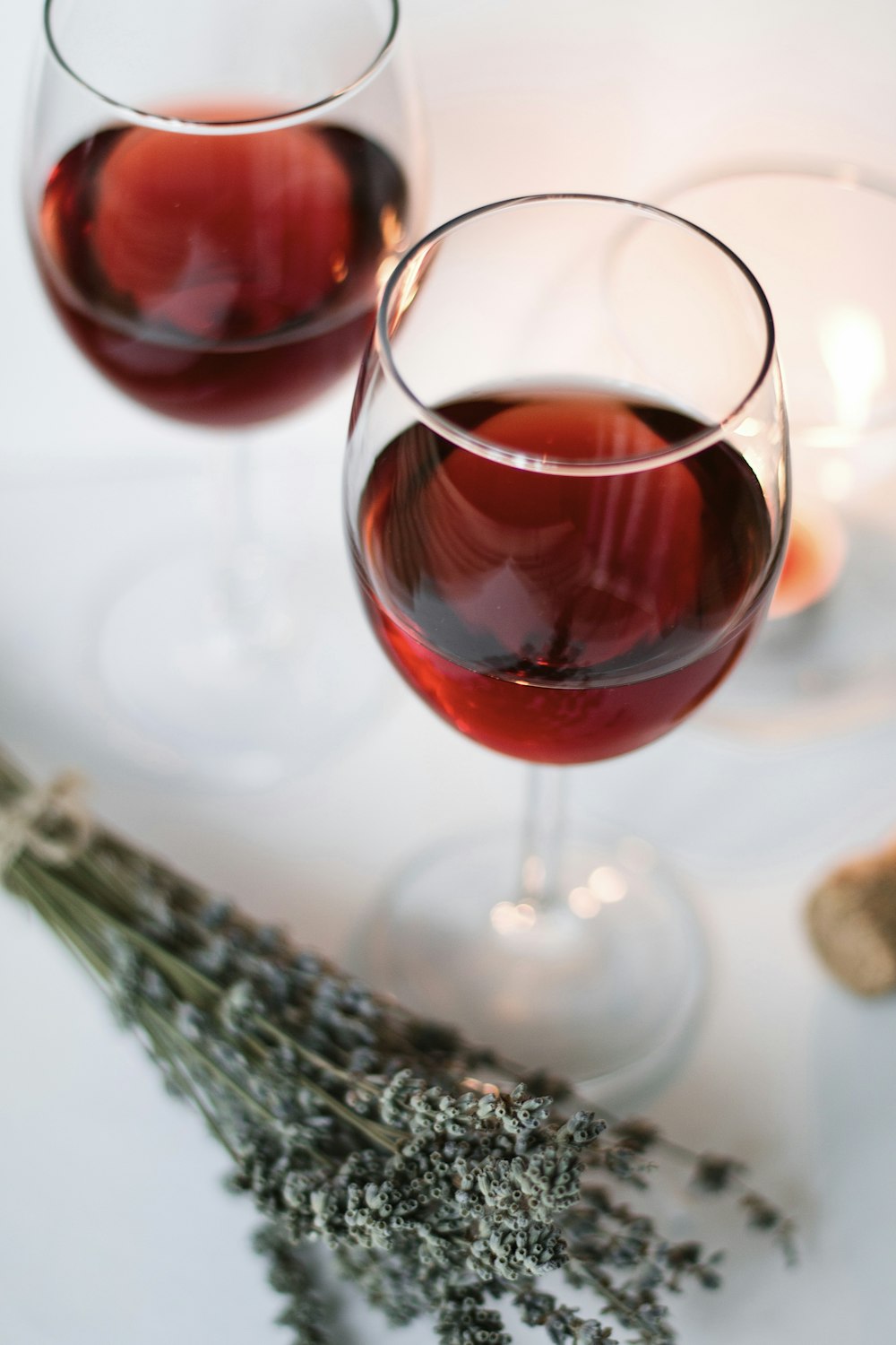 clear wine glass with red wine