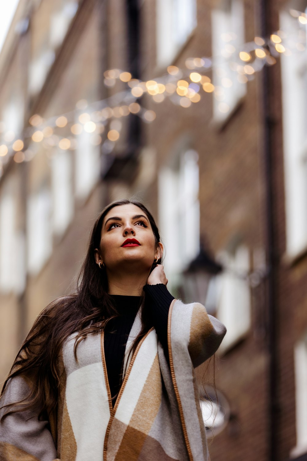 woman in black and white jacket