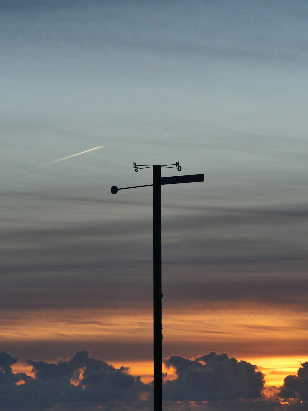 silhouette of cross during sunset