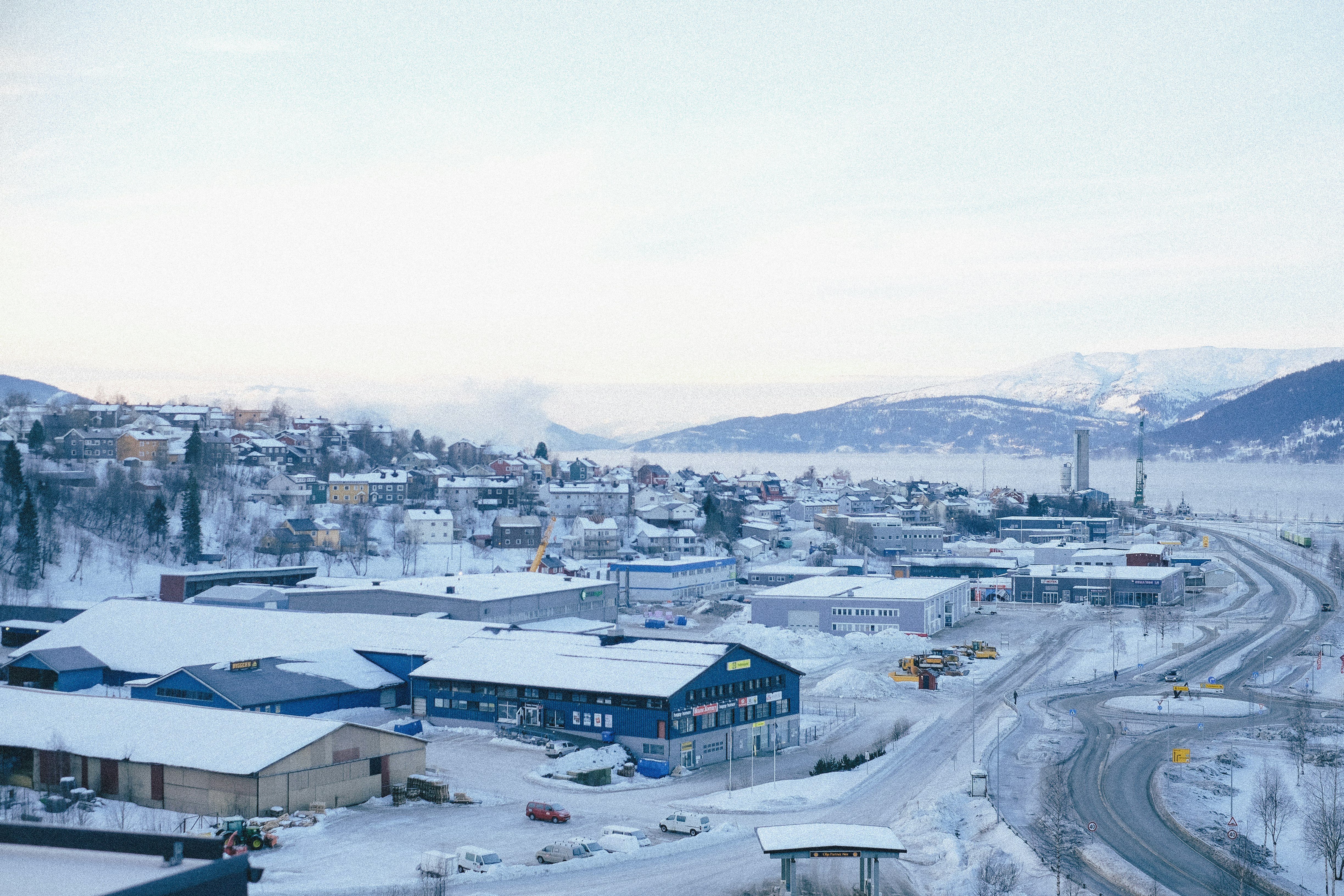 A gorgeous winter wonderland in Norway scene of workplace warehouses