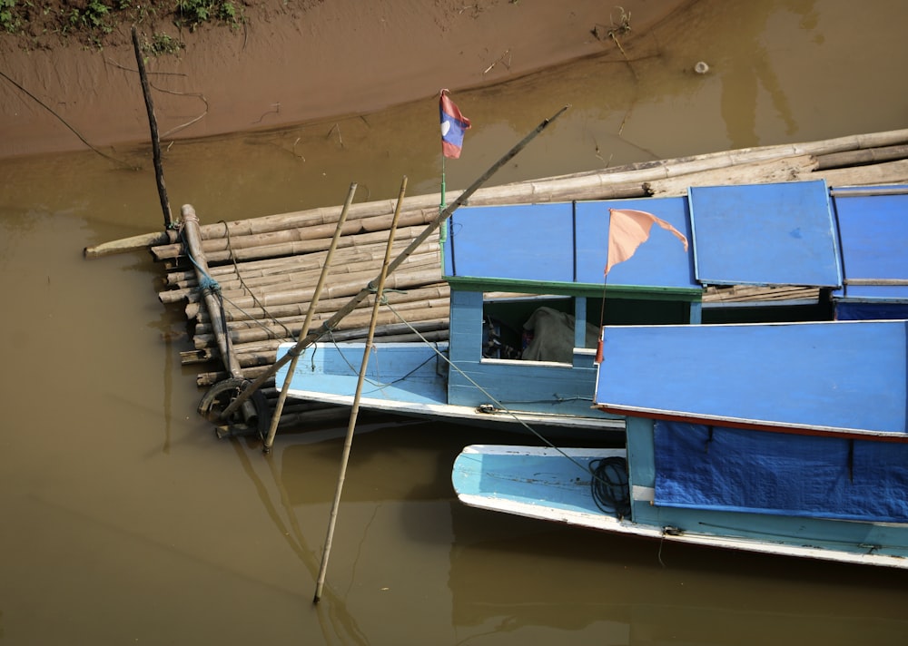 a couple of boats that are sitting in the water