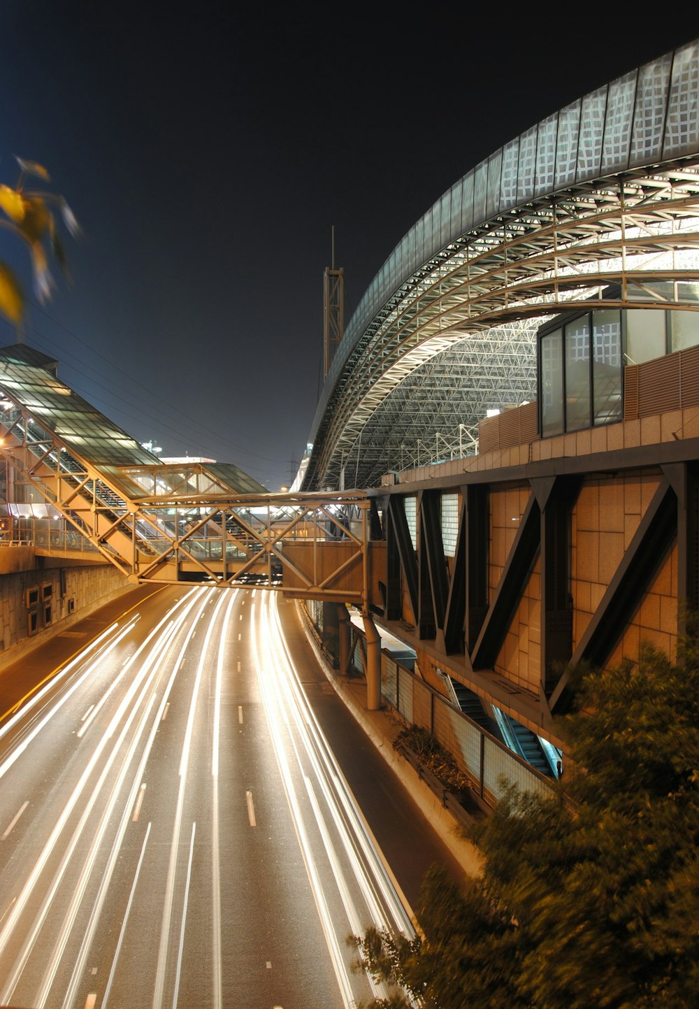 time lapse photography of cars on bridge during night time