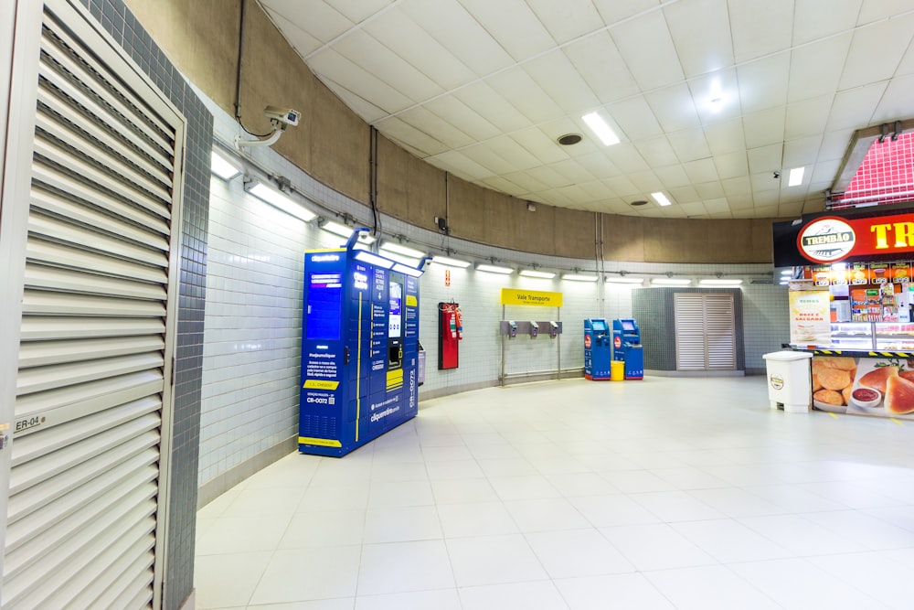 blue and yellow door on white tiled floor