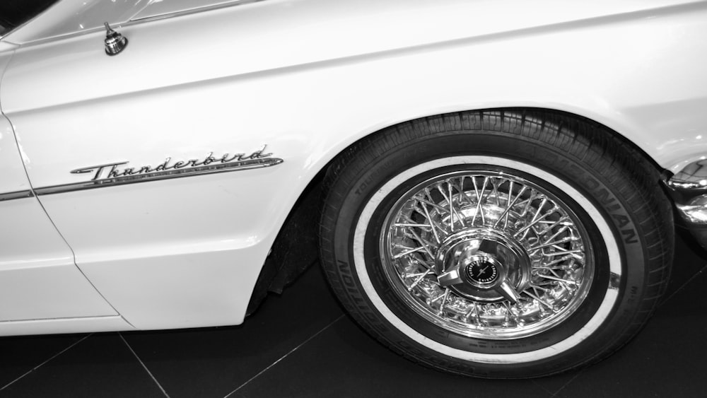white car with chrome wheel