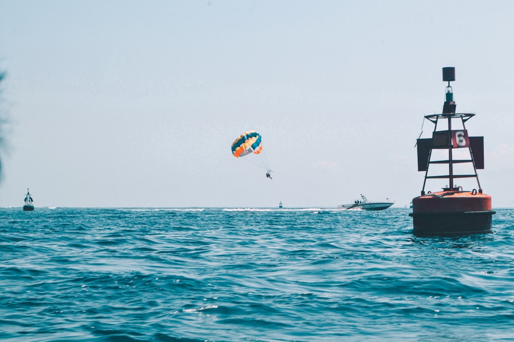 person surfing on sea during daytime