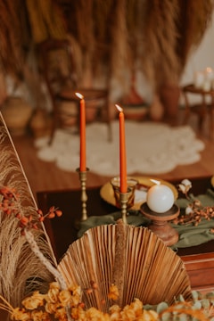 A serene setting with flowers and candles for a santería love ceremony.