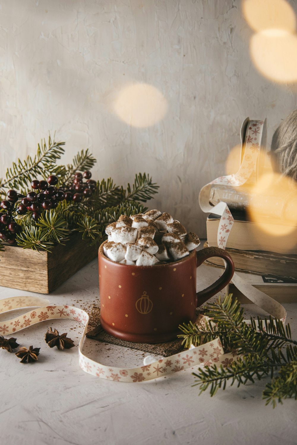 brown ceramic mug on brown wooden table