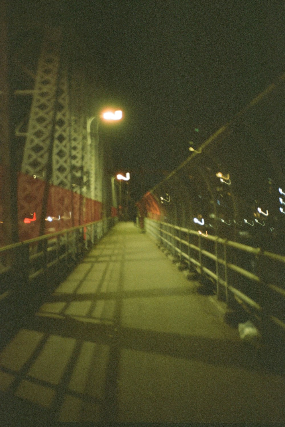 red and white bridge during night time