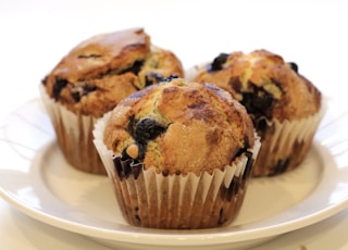 brown cupcakes on white ceramic plate