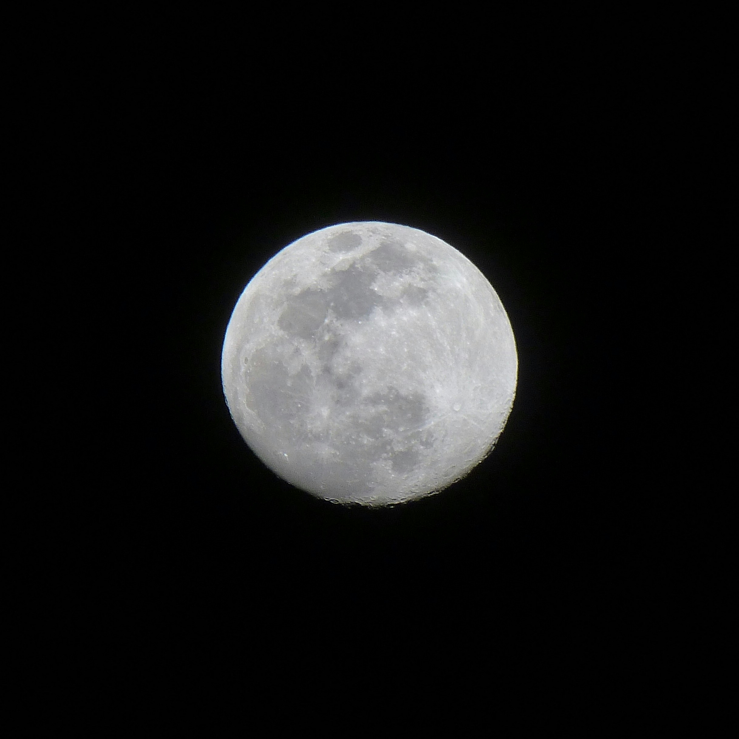full moon in dark night sky