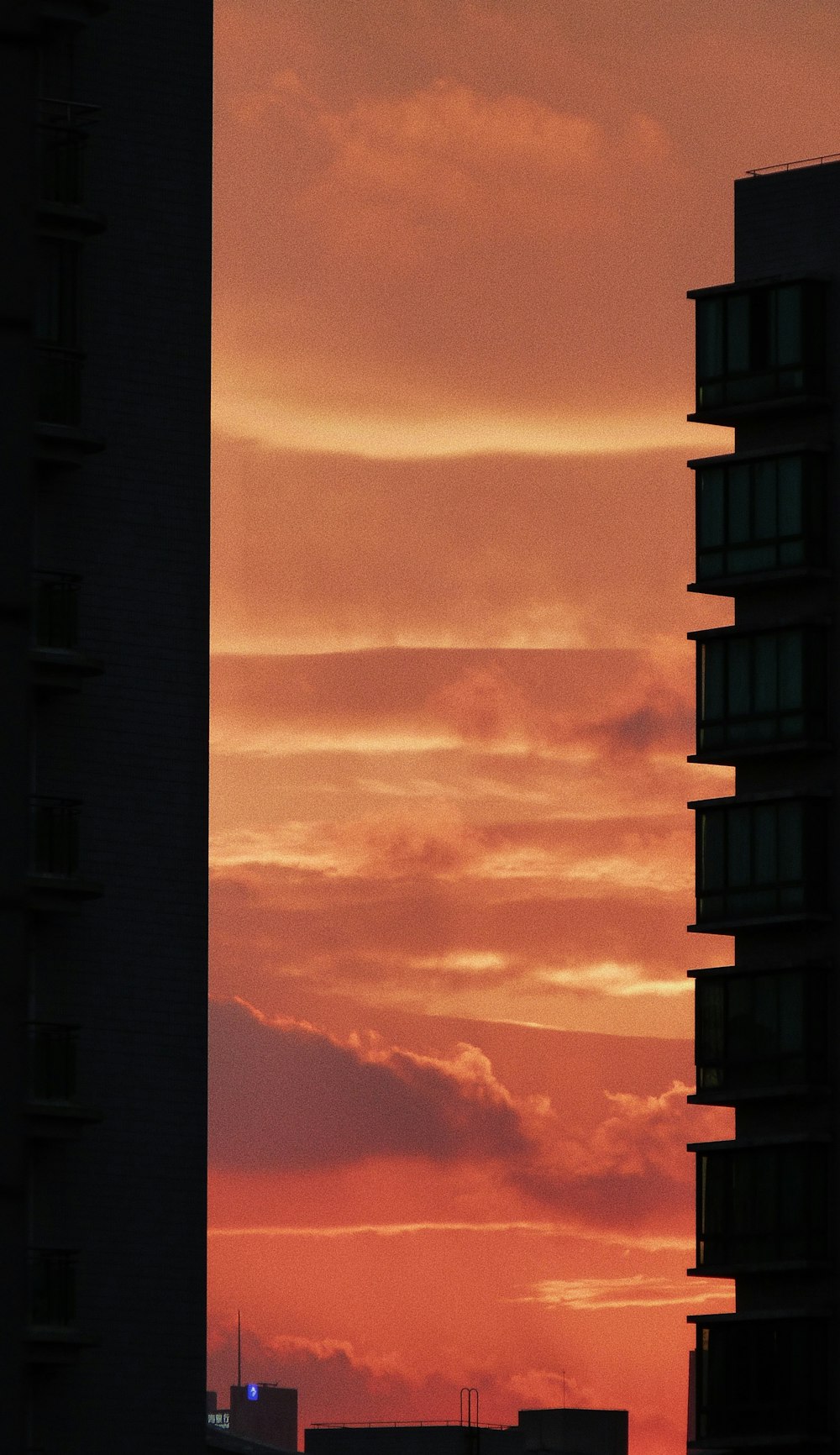 silhouette of building during sunset