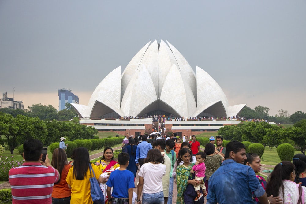 people standing near white dome building during daytime