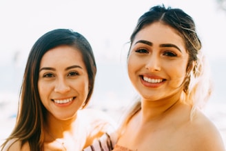 woman smiling and smiling during daytime