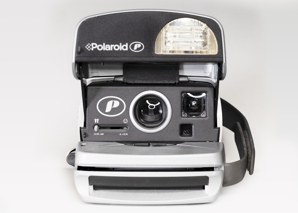 black and white polaroid instant camera