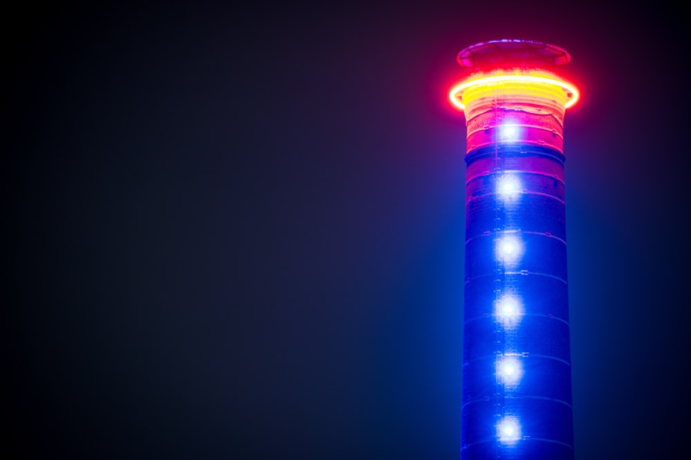 blue and red tower with blue lights