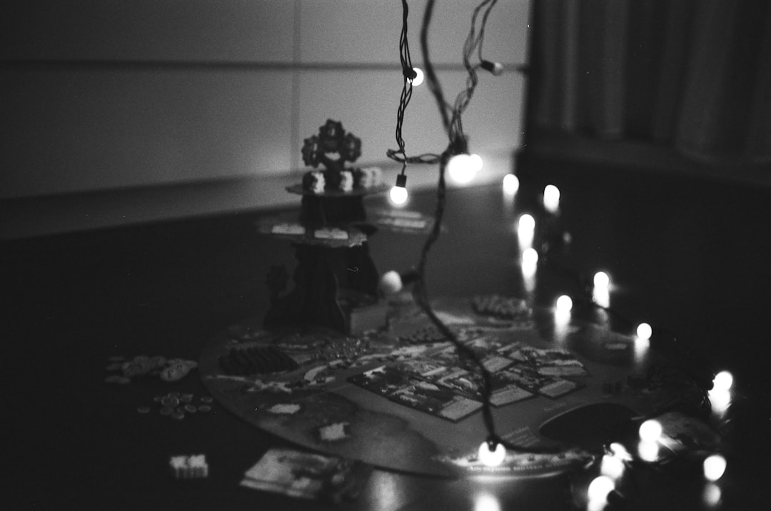 grayscale photo of lighted candles
