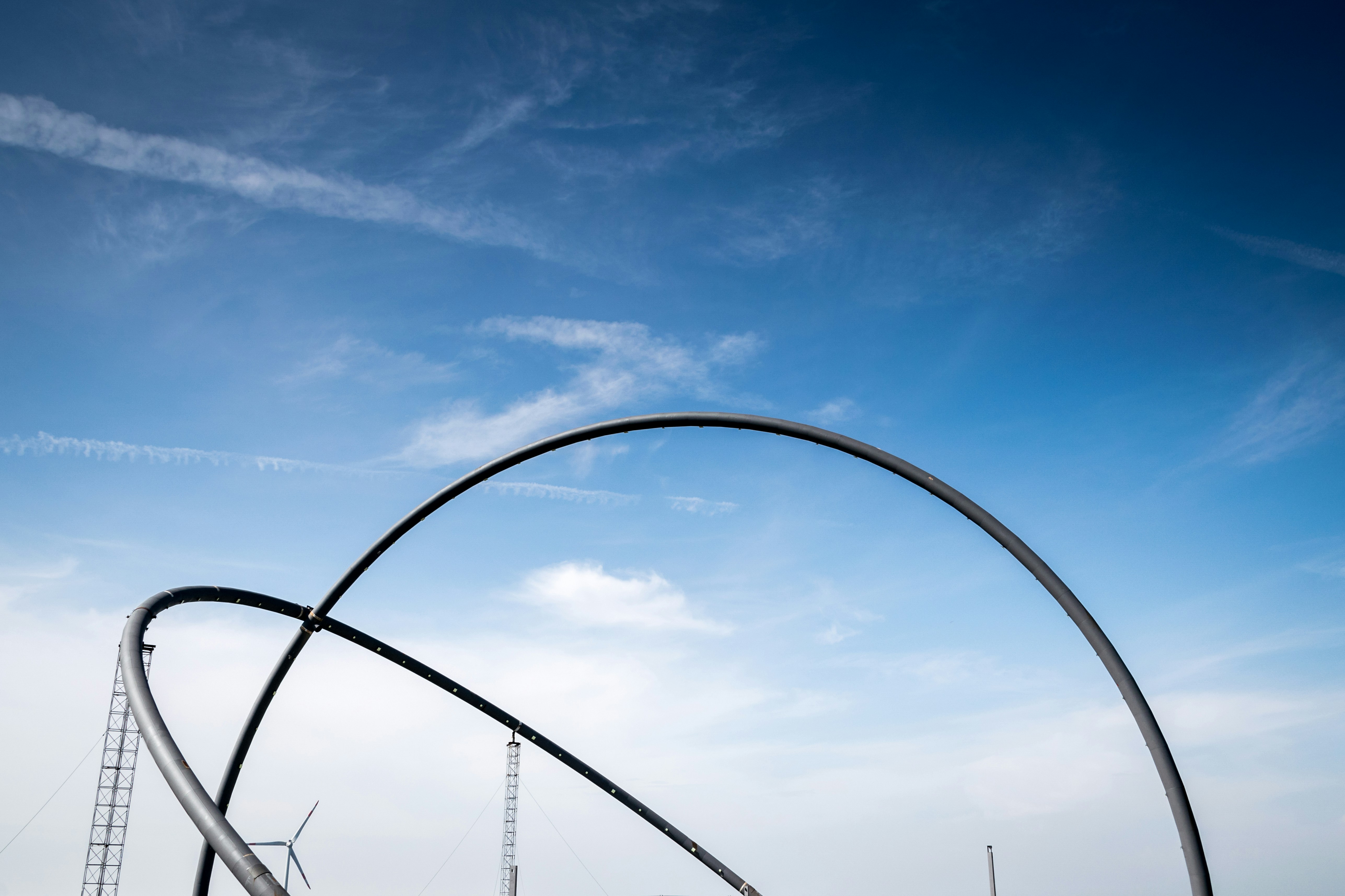 gray metal round frame under blue sky during daytime