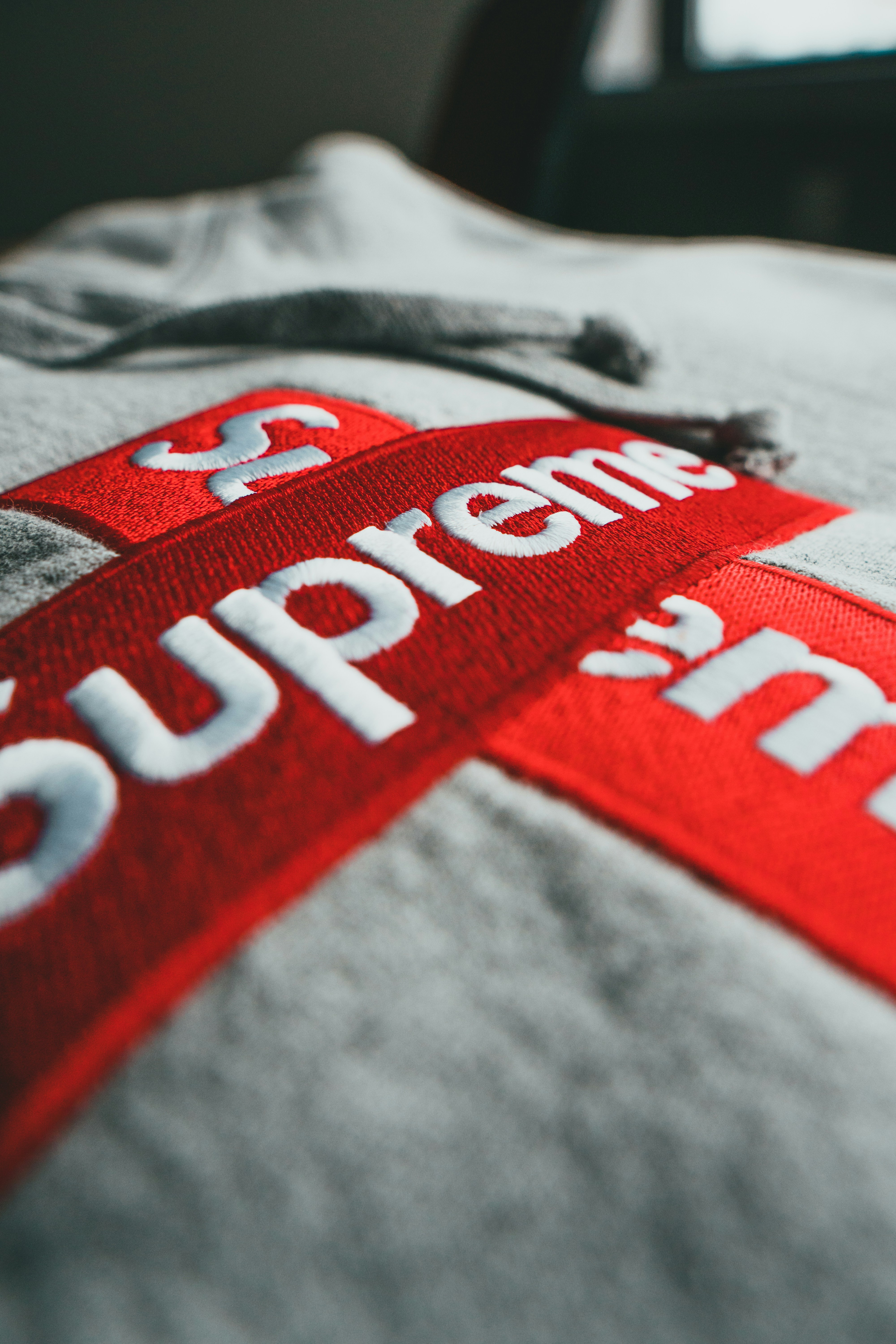 gray and red printed textile