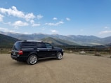 black suv on brown field during daytime