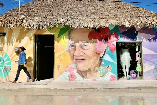 Woman in red and white floral hijab — Isla Holbox, Mexico