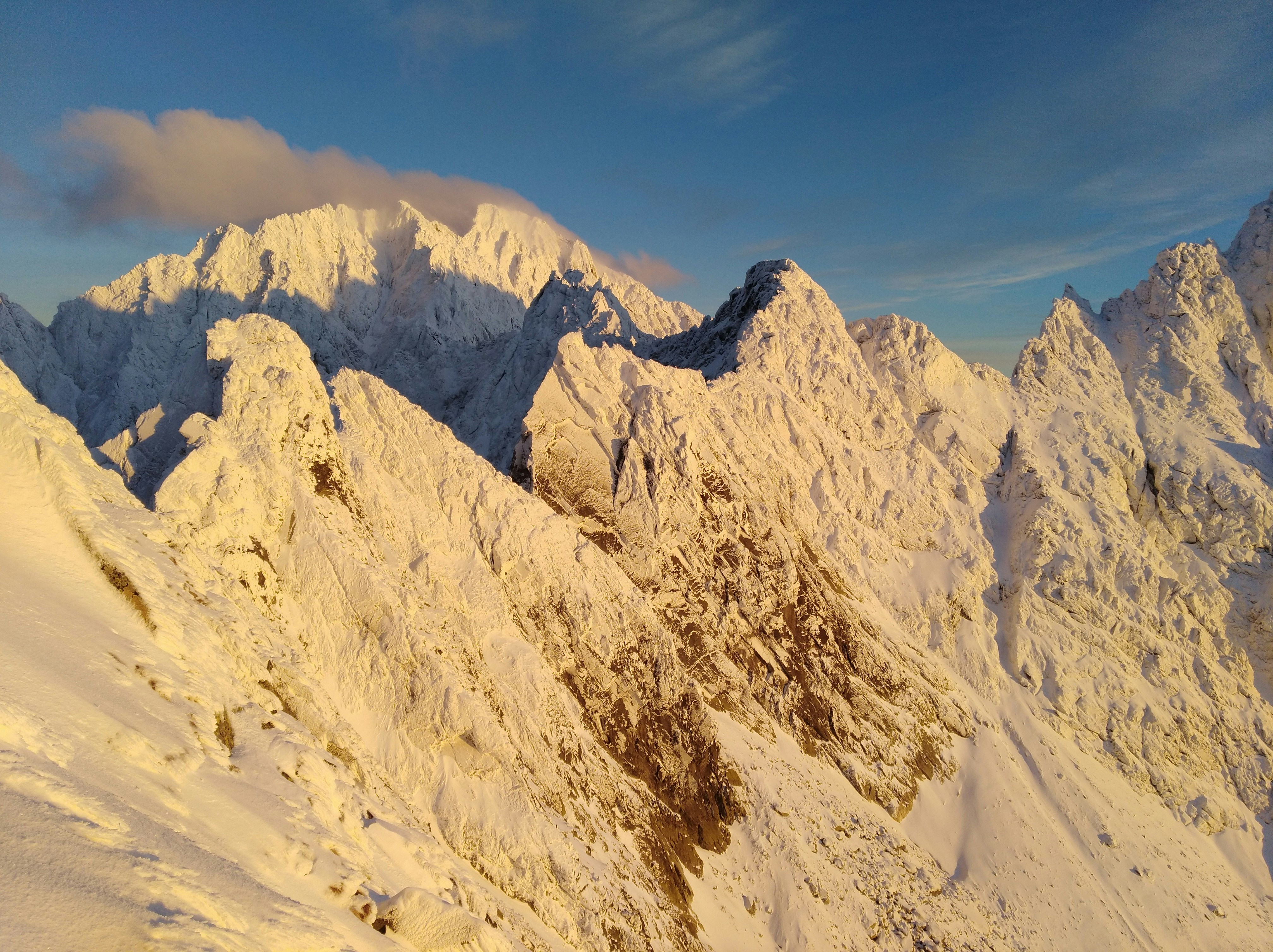 white and brown mountain under blue sky during daytime