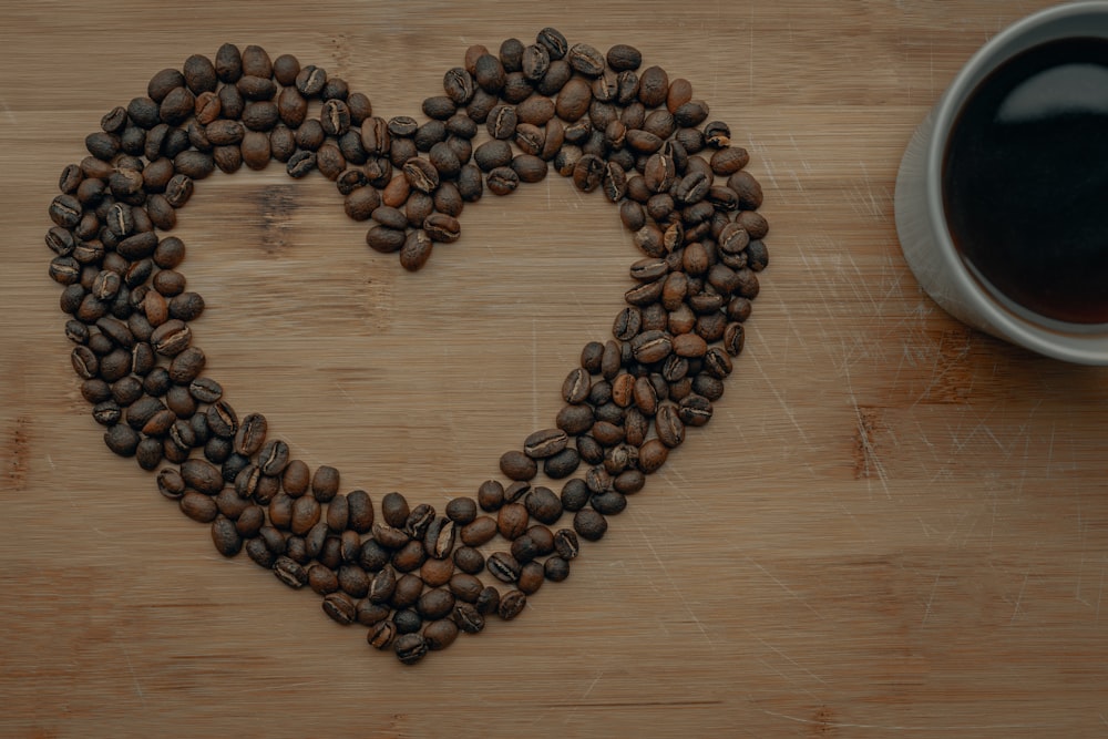 black and brown round beads on brown wooden table