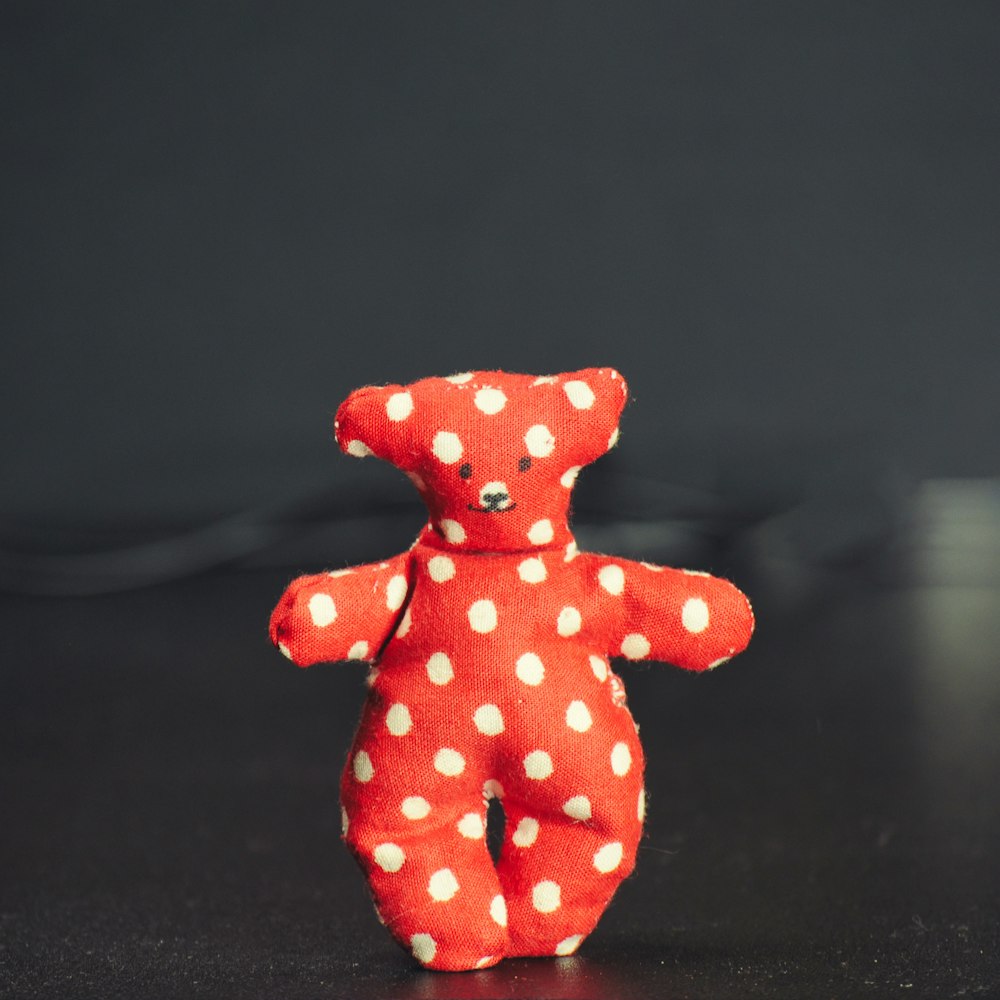 red and white polka dot bear plush toy